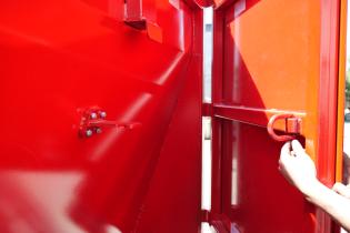Dumpster door lock ring